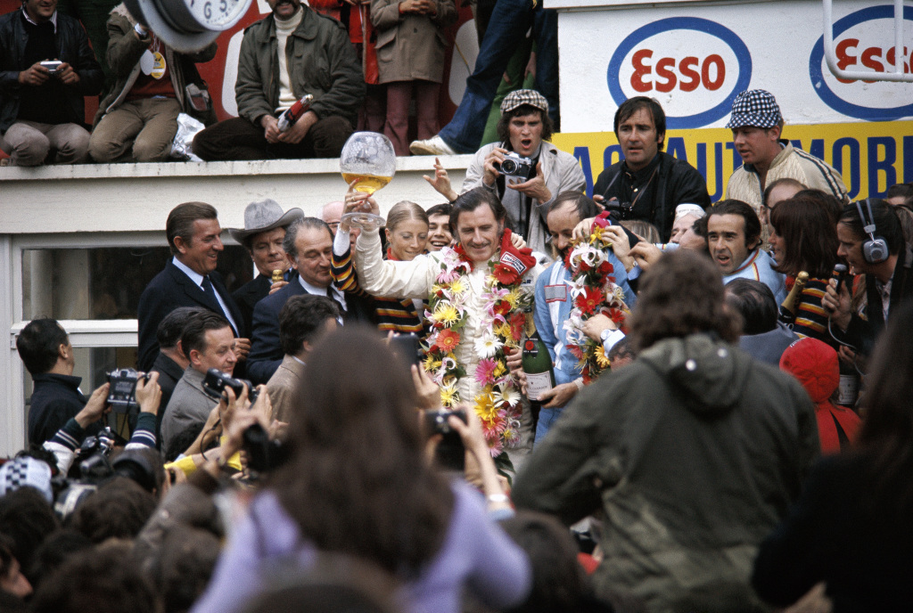 Graham Hill on the podium after winning Le Mans