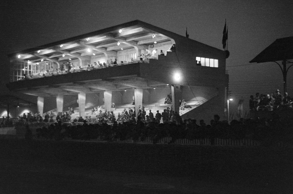 The main grandstand at night during the 24 Hours of Le Mans at Circuit de la Sarthe